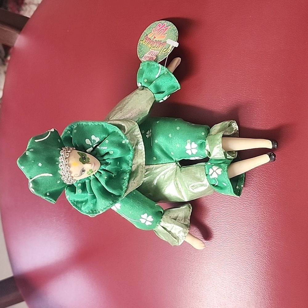 Vintage porcelain jester doll. Lucky 4 leaf clover.